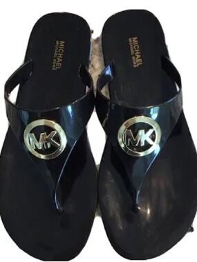 Michael Kors LILLIE Sandals
Flip Flops Black jelly gold logo